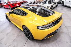 Image result for Sunburst Yellow 2017 Aston Martin