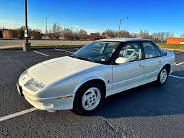 Image result for Bright Red 1994 Saturn