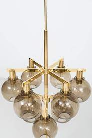 hans agne jakobsson ceiling lamp in brass and smoked glass ceiling lamp lamp interior lighting