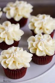 Moist And Delicious These Red Velvet Cupcakes Are Decorated With Pretty Cream Cheese Icing Flowers Velvet Cupcakes Red Velvet Cupcakes Recipe Gourmet Cupcakes