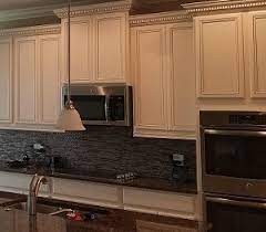 We are looking at remodeling our laundry room cabinetry. Kitchen Cabinet Painting In Houston Tx Painters Refinishing Cabinets
