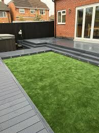 Garden Decking And Patio Ideas For Gardens Small And Large From Traditional Brick Paving To Modern Ti Small Garden Decking Ideas Small Garden Design Backyard