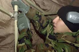 U.S. Air Force SENIOR AIRMAN Charlie Franklin, 51st Civil Engineer  Squadron, fire fighter, sets-up a