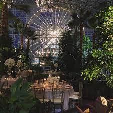 Enchanting Evening Wedding At The Crystal Gardens At Navy Pier With The Iconic Ferris Wheel In T Chicago Wedding Venues Enchanted Garden Wedding Crystal Garden