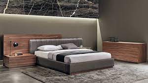 The décor behind the bed is decorated with a beautiful grey white 3d plant patterns that match the grey coloured walls on the other sides. Double Headboard Bed Lazzoni Furniture Bed Furniture Design Modern Master Bedroom