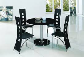 Modern style round dinning table and 2 4 dining chairs w chrome legs kitchen set. Planet Black Round Glass Dining Table Glass Vault Furniture