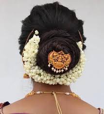 When it comes to a traditional indian wedding, you can never go wrong with a simple and sleek bun. 10 Different Bridal Hairstyles For South Indian Wedding 2021