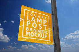A set of two mockups showing rendered lamp posts with banner(s). Square Lamp Post Banner Mock Up By Massdream