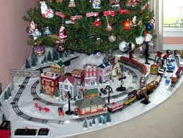 When enthusiasts set out to create a large model railway, they choose a theme or a specific time period they want to reflect in the model. Lionel Christmas Train Layout My Marx 027 Tinplate Christmas Layout Toy Train Operating And Christmas Tree Train Christmas Train Christmas Train Set