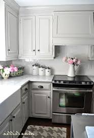 Kitchen cabinets and tiled backsplash in warm colors. 50 Outstanding Kitchen Backsplash Ideas Gray Cabinets Page 4 Of 55 Gray Kitchen Backsplash Kitchen Renovation New Kitchen Cabinets