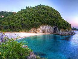 Rovinia Is Located In The Area Of Liapades In Western Corfu Just South Of The Rocky Shores Of Paleokastritsa Small Corfu Beaches Beach Paradise Corfu Greece