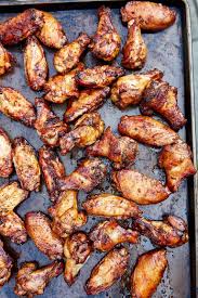 These wings marinated with the sweet and tangy asian inspired homemade barbecue sauce are just great for the grill. Irresistible Smoky Crispy Charcoal Grilled Chicken Wings Marinated In Olive Oil Herbs A Cooking Chicken Wings Grilled Chicken Wings Grilled Chicken Recipes