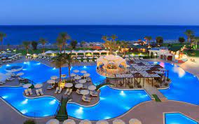 The natural landscape, imposing buildings, ancient towns and picturesque villages meet amazing beaches, fashion boutiques, top restaurants, and dance clubs. 5 Star Luxury Beach Front Hotel In Rhodes Rodos Palladium Hotel