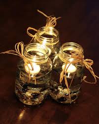 Pin By Maggie Mello Petisce On Decorating With Floating Candles Mason Jar Floating Candle Centerpieces Floating Candles Mason Jars Floating Candle Centerpieces