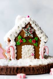 How To Make A Beautiful And Simple Homemade Gingerbread House With Royal Icing And In 2020 Gingerbread House Recipe Homemade Gingerbread House Halloween Cookie Recipes