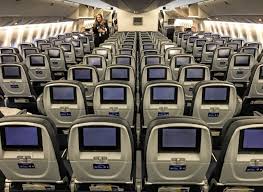 Each one of united's domestic b777 features a small, somewhat cramp first class cabin located in the plane's front. Review Across The Pond In United S Shrinking Economy Seat