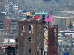 Large variety of commercial christmas decorations and high quality holiday lighting set us apart. Mystery Artists Scale Abandoned Factory In Montreal To Decorate It For Christmas