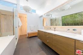 However, the artful juxtaposition between the walnut brown and matte white creates a blend of bright modernity and classical traditions. 40 Mid Century Modern Primary Bathroom Ideas Photos Home Stratosphere