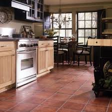 Want to use maple cabinets in the kitchen, and you need ideas on how to match them to the backsplash? Pin By Jilinda Dygert On Decor Flooring Kitchen Flooring Saltillo Tile
