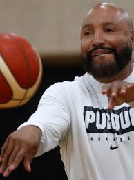 Purdue basketball assistant Brandon Brantley helps Zach Edey develop