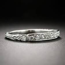 This band is made from solid platinum and it. Art Deco Style Diamond Wedding Band