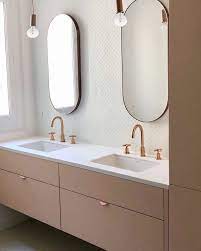 superfront on instagram yes please to this bathroom by benedicteboiron who used the copper holy wafer handles to match bathroom mdf cabinets bathroom vanity