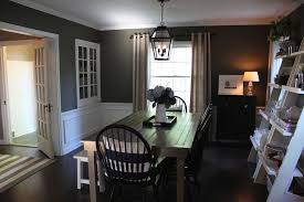 Mirror on wall with molding. Gray Walls Dark Floors Wainscoting Cottage Dining Rooms Dining Room Wainscoting White Wainscoting