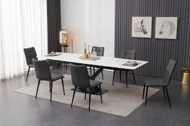 Whether you're refurbishing your dining room, adding seating around the kitchen island, or looking for stylish new barstools for entertaining, costco offers a variety of seating options to fit your every need. Ceramic White Extending Dining Table With 6 Grey Faux Leather Chairs Chelsea Home And Leisure Ltd