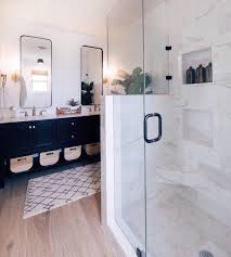 Now here is a fabulous idea, for anyone who hates to mop up the bathroom floor after a bath or shower. Modern Master Bathroom Reveal