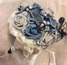 Take a look at some awesome ideas! Corpse Bride Halloween Wedding Bridal Bride Bouquet Flowers Blue Grey Black Bouquet Wedding Flowers Gothic Fantasy Wedding Flower Bouquet Blue Wedding Bouquet Corpse Bride Wedding Wedding Bridal Bouquets