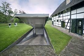 Hidden Underground Garage For Storage Trailers Trucks And Wood Shop With Elevator To 1st Floor Garage Underground Homes Underground Garage Garage Design