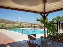 Woman in jacuzzi on background of ocean. Provincial Holiday Home With Jacuzzi And Pool In Resuttano Resuttano Italien
