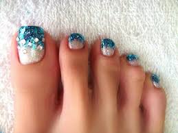 While adorning yourself in the best… Toe Nail Designs For Summer 2019