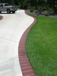 Over time, calcium deposits may form on red brick from constant exposure to water from spray the brick driveway with a 3,000 psi or less power washer to remove loose dirt. 30 Creative Decorative Landscape Curbing Ideas Driveway Design Brick Edging Patio Edging