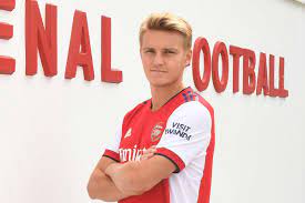 Arsenal win race to sign real madrid midfielder martin ødegaard on loan. Kzdfzxc5miltwm