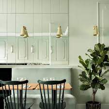 mullan lighting on instagram the greenish interior of the bistrot rougemont designed by virgi comercial interior design interior design mood board interior