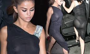 Selena Gomez shows off nipples in gown with The Weeknd 