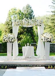 Black And White Wedding Arch Decorations 16 All White Wedding Ideas Inspired By This White Wedding Flowers White Wedding Arch All White Wedding