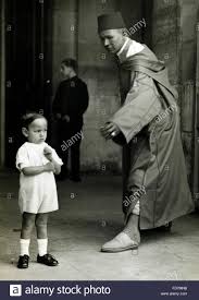 Hassan II, King of Morocco, with his father in Paris, 1932 Stock ...