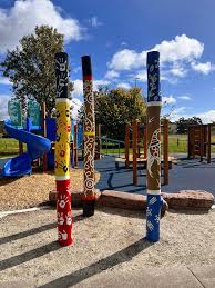How fantastic do our totem poles look on the bottom playground! We are  looking forward to sharing the stories behind the artwork on our totem  poles with our students when they return