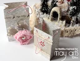 All it needs is a pretty bow to finish the look. Diy Decorating Holiday Gift Bags With Ribbon Online Ribbon