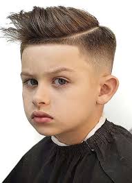 Boys fade haircuts keep the sides clean, short and simple, while a hard side part adds a classy yet cool the pompadour fade is the perfect boys hairstyle for a stylish kid. 10 Best Hair Cuts For Kids Boys To Create In 2020 Hairstylesco