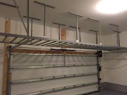 In most garages, storage space is at a premium. Ceiling Racks Shively Overhead Garage Storage Ideas Gallery Louisville Solutions Homifind