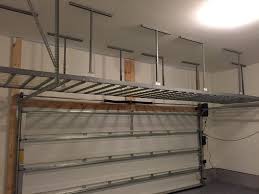Overhead storage is a great way to maximize your space and store. Ceiling Racks Shively Overhead Garage Storage Ideas Gallery Louisville Solutions Homifind