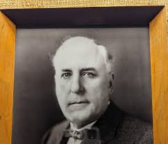 Gov. Arthur J. Weaver (non-Native Governor of Nebraska), shaking hands with  Mrs. Mary (Mitchell) McCauley (Omaha)