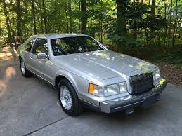 Image result for Silver 1990 Lincoln