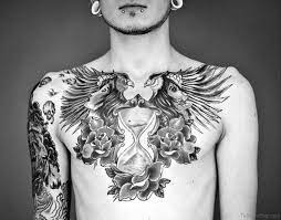 Whether you choose a bird, an egyptian symbol, or an angel, this art looks best when spread across the torso and to the shoulders. 55 Favorite Birds Tattoos On Chest