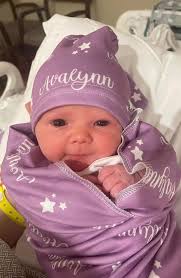 Who does baby girl look like?