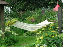 Summer Days Spent Lazing About On A Hammock This Sounds Absolutely Blissful Let S Just Take The Mosquit Garden Hammock Backyard Hammock Garden Bench Seating