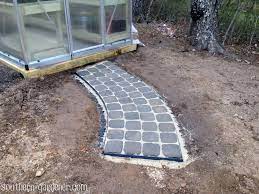 The shorter the blocks, the easier it is to make the curve because larger blocks create larger spaces along the outside of the curve.so with rectangular pavers, lay them with their short sides. Diy Paver Walkway The Southern Gardener